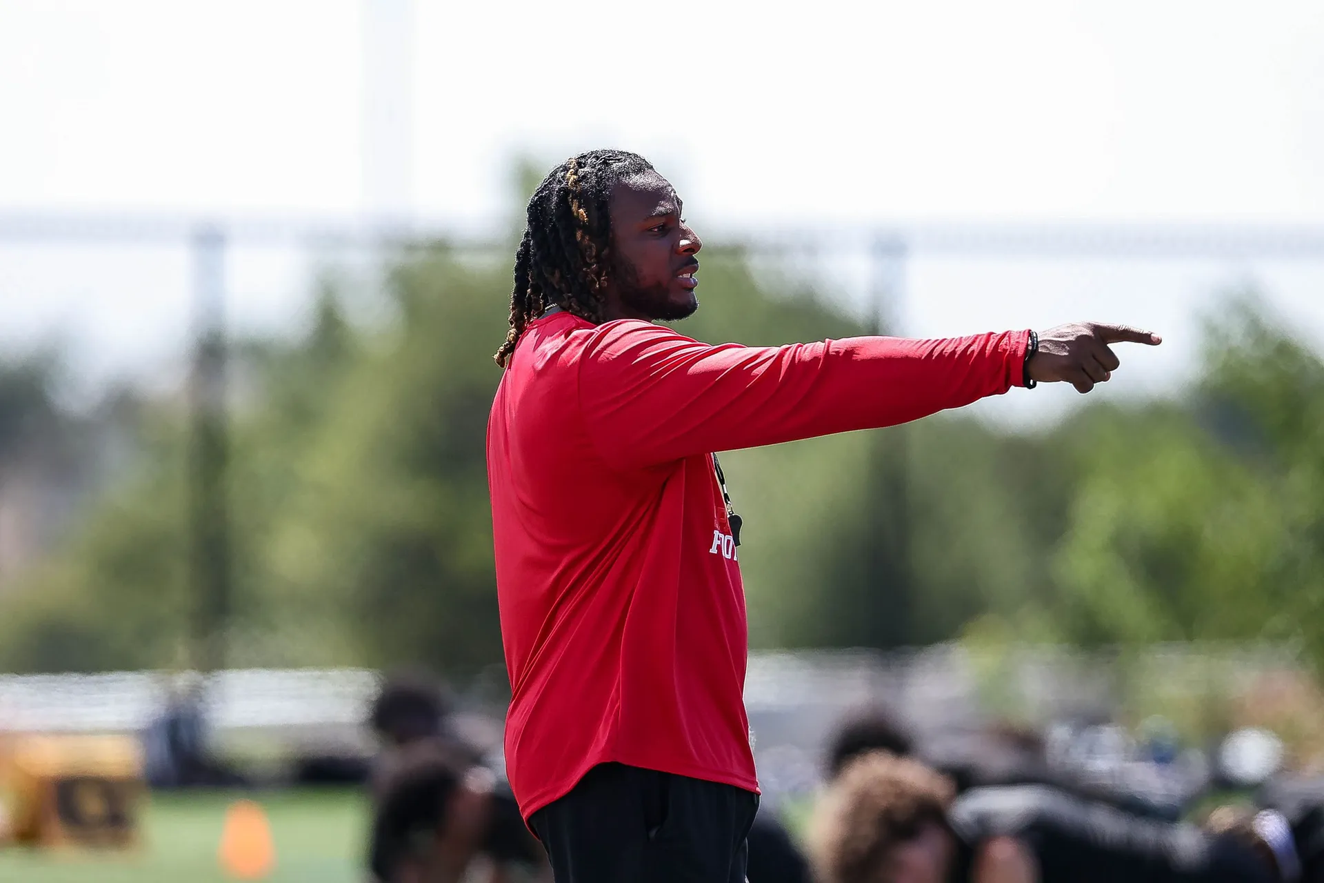 Black and white portrait of Coach Darnell Newman on the sideline