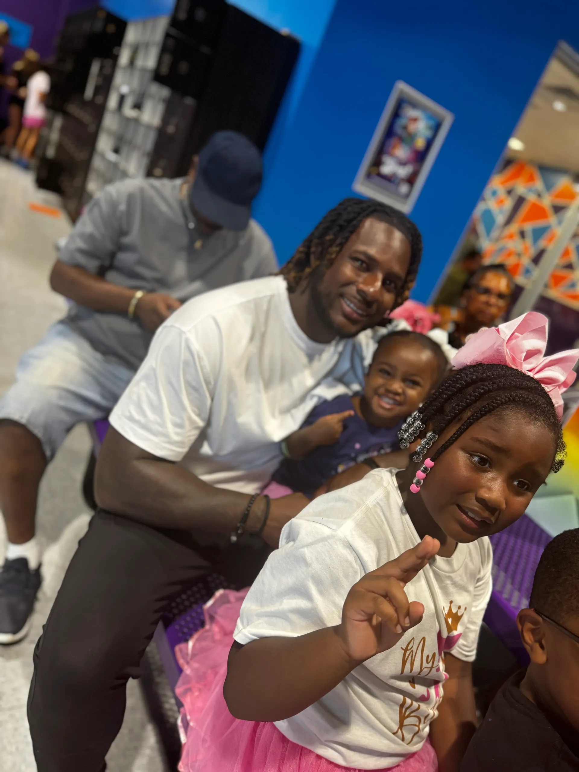 Coach Darnell Newman with his family at a celebration